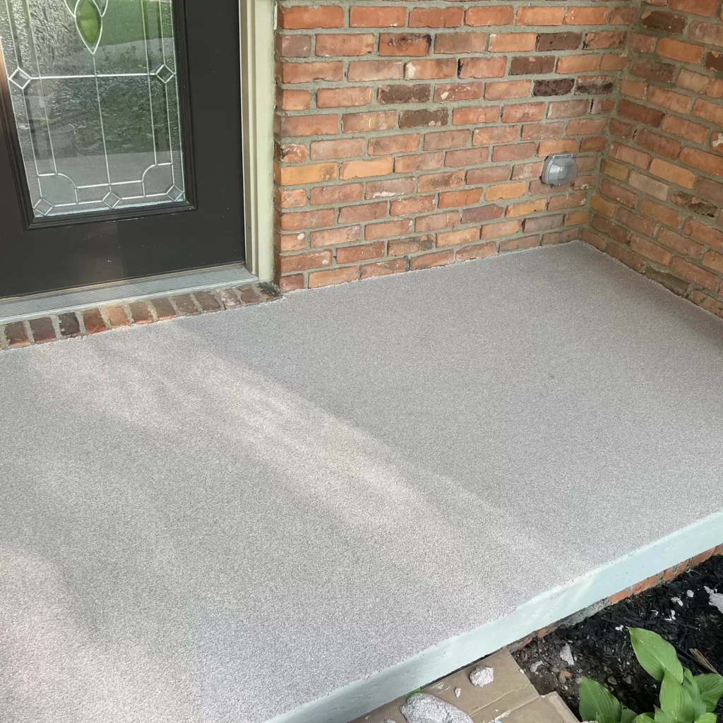 After – smooth, stone-like SpreadRock finish.